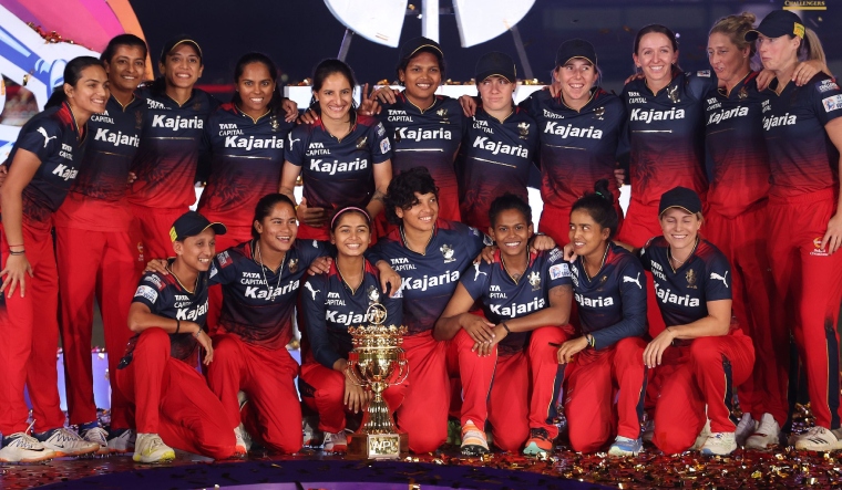 RCB women with WPL 2024 trophy